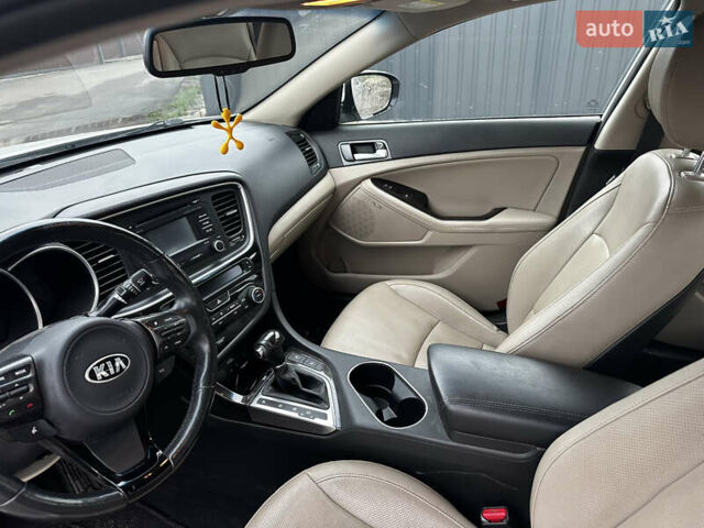 Белый Киа Оптима, объемом двигателя 2.36 л и пробегом 132 тыс. км за 10900 $, фото 5 на Automoto.ua