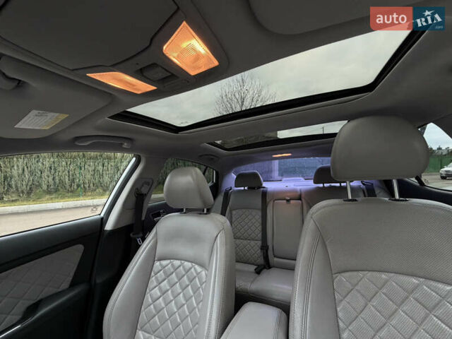 Белый Киа Оптима, объемом двигателя 2 л и пробегом 209 тыс. км за 13000 $, фото 13 на Automoto.ua