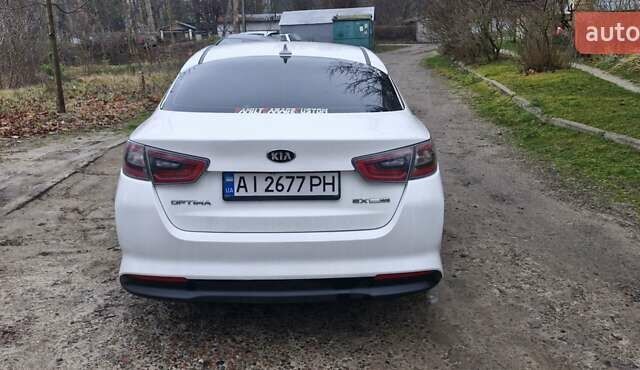 Білий Кіа Оптіма, об'ємом двигуна 2.4 л та пробігом 296 тис. км за 11800 $, фото 2 на Automoto.ua