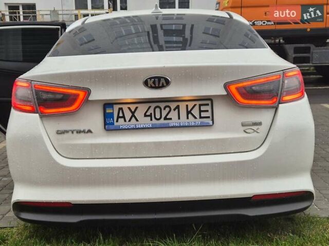 Белый Киа Оптима, объемом двигателя 2.36 л и пробегом 185 тыс. км за 6500 $, фото 6 на Automoto.ua