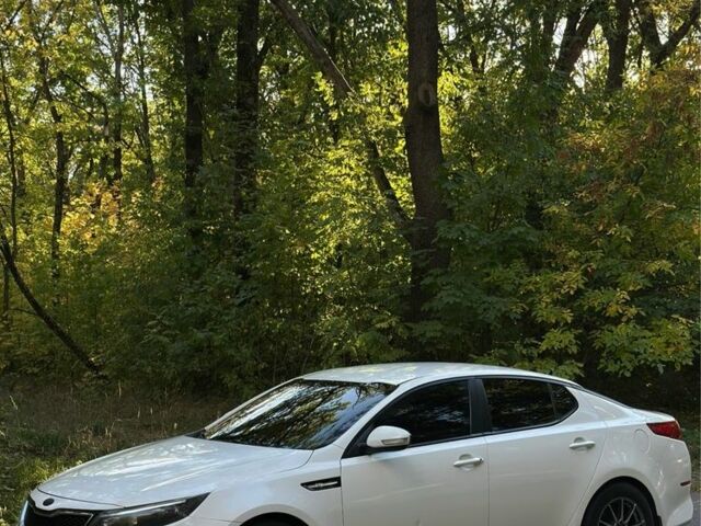 Білий Кіа Оптіма, об'ємом двигуна 2 л та пробігом 258 тис. км за 9000 $, фото 1 на Automoto.ua