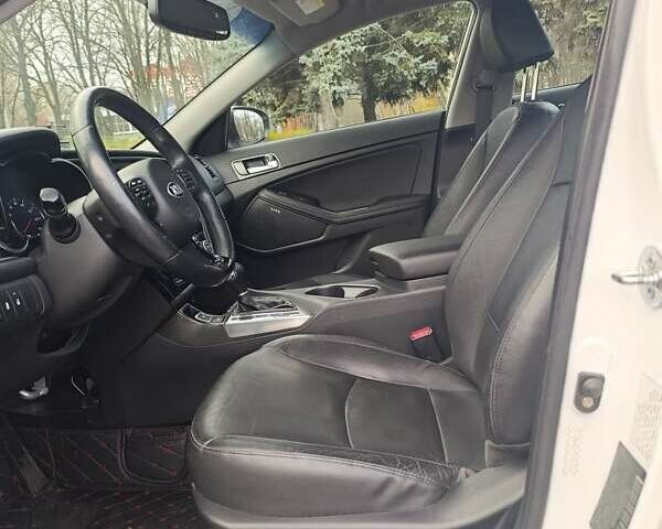 Белый Киа Оптима, объемом двигателя 2.36 л и пробегом 258 тыс. км за 10300 $, фото 43 на Automoto.ua