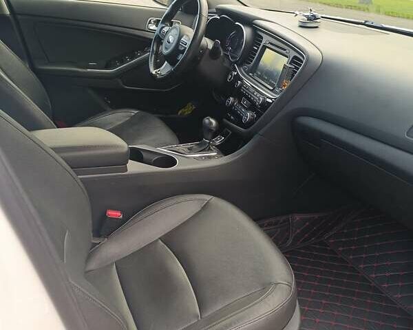 Белый Киа Оптима, объемом двигателя 2.36 л и пробегом 258 тыс. км за 10300 $, фото 25 на Automoto.ua