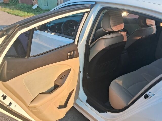 Белый Киа Оптима, объемом двигателя 2.4 л и пробегом 165 тыс. км за 9400 $, фото 3 на Automoto.ua