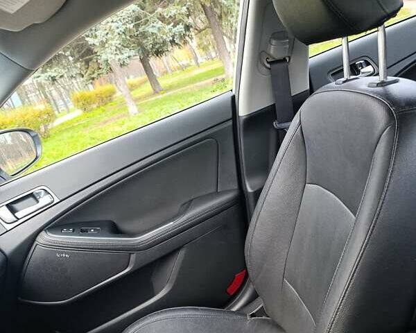 Белый Киа Оптима, объемом двигателя 2.36 л и пробегом 258 тыс. км за 10300 $, фото 30 на Automoto.ua