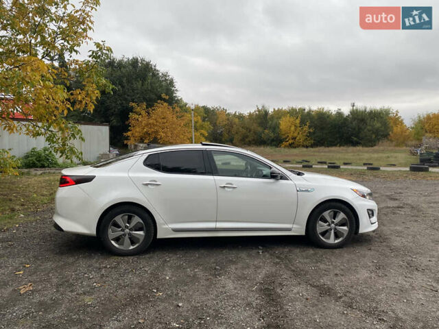 Білий Кіа Оптіма, об'ємом двигуна 2.36 л та пробігом 235 тис. км за 8800 $, фото 8 на Automoto.ua