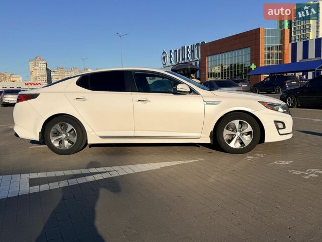 Білий Кіа Оптіма, об'ємом двигуна 2.36 л та пробігом 230 тис. км за 9900 $, фото 4 на Automoto.ua