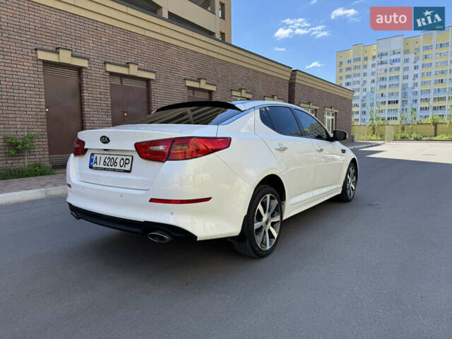 Белый Киа Оптима, объемом двигателя 2.36 л и пробегом 205 тыс. км за 11500 $, фото 5 на Automoto.ua