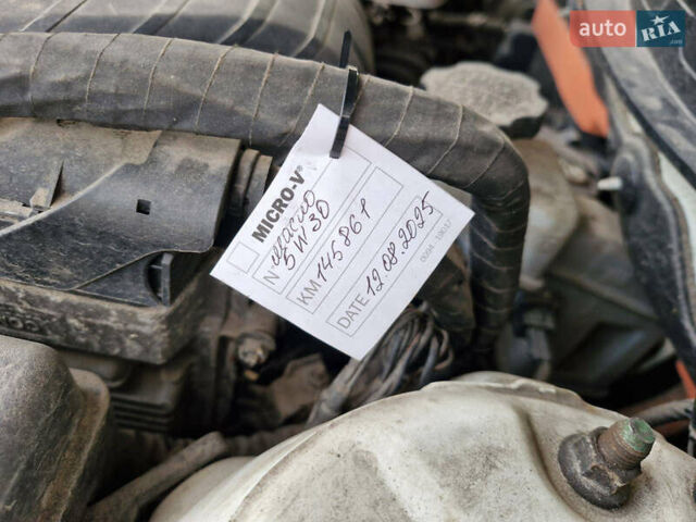 Білий Кіа Оптіма, об'ємом двигуна 2.36 л та пробігом 220 тис. км за 8600 $, фото 10 на Automoto.ua