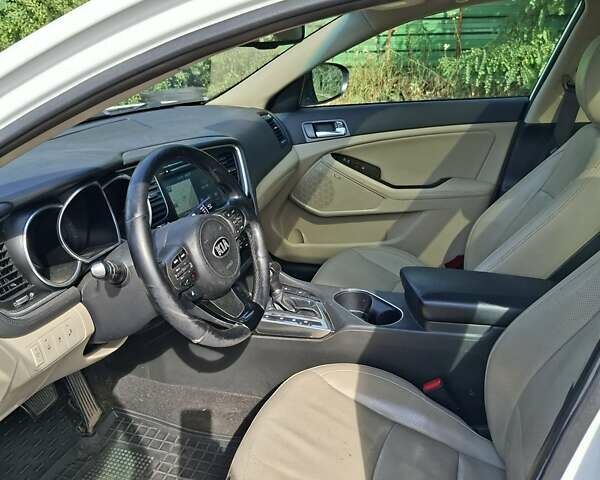 Белый Киа Оптима, объемом двигателя 2.36 л и пробегом 175 тыс. км за 9500 $, фото 10 на Automoto.ua