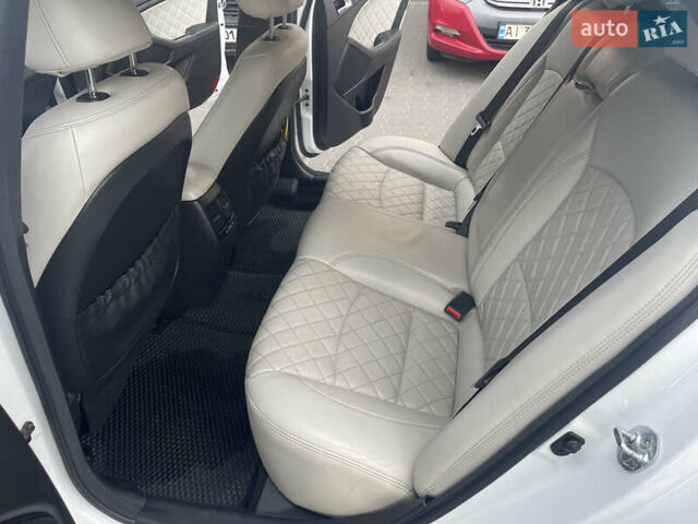 Білий Кіа Оптіма, об'ємом двигуна 2 л та пробігом 173 тис. км за 12800 $, фото 13 на Automoto.ua