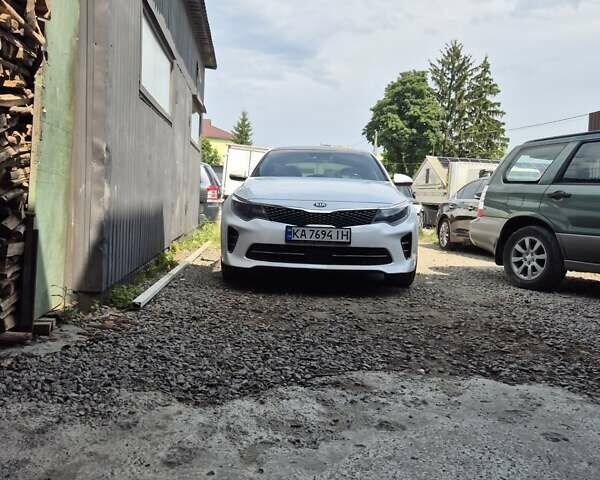 Білий Кіа Оптіма, об'ємом двигуна 2 л та пробігом 173 тис. км за 13000 $, фото 12 на Automoto.ua