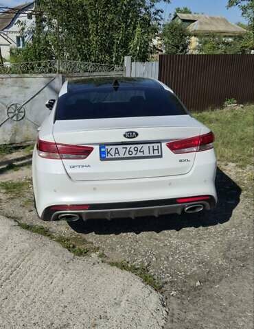 Білий Кіа Оптіма, об'ємом двигуна 2 л та пробігом 173 тис. км за 13000 $, фото 2 на Automoto.ua