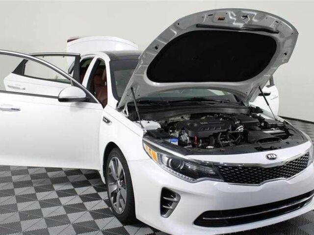 Белый Киа Оптима, объемом двигателя 2 л и пробегом 66 тыс. км за 10500 $, фото 5 на Automoto.ua