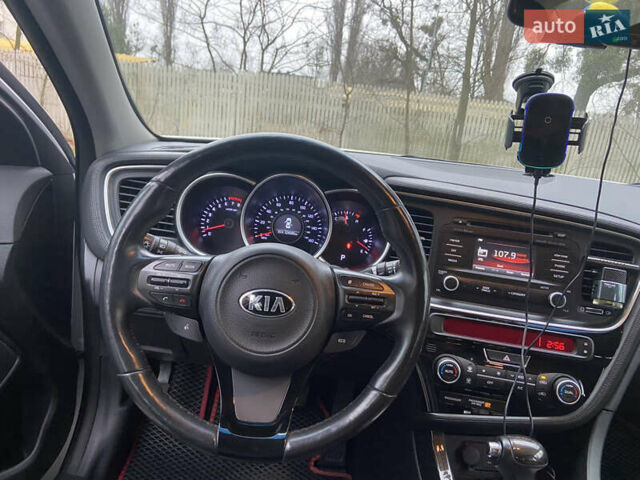 Білий Кіа Оптіма, об'ємом двигуна 2.4 л та пробігом 194 тис. км за 10500 $, фото 6 на Automoto.ua