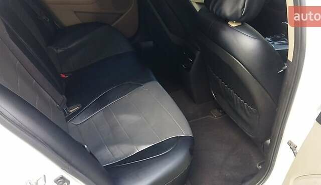 Белый Киа Оптима, объемом двигателя 2.4 л и пробегом 147 тыс. км за 10200 $, фото 8 на Automoto.ua