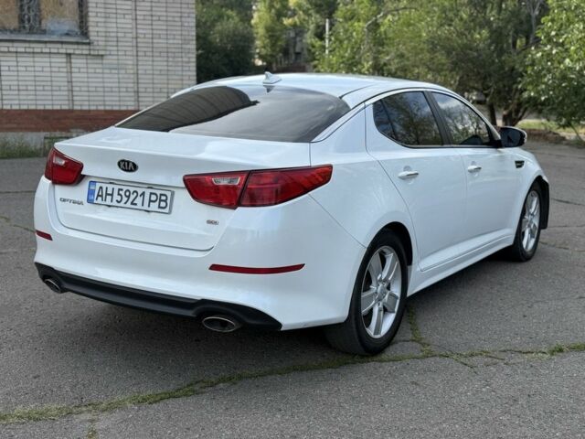 Білий Кіа Оптіма, об'ємом двигуна 2.4 л та пробігом 155 тис. км за 9600 $, фото 4 на Automoto.ua