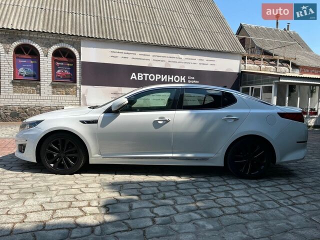 Білий Кіа Оптіма, об'ємом двигуна 2 л та пробігом 98 тис. км за 13000 $, фото 6 на Automoto.ua
