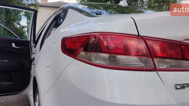 Белый Киа Оптима, объемом двигателя 2.4 л и пробегом 150 тыс. км за 12300 $, фото 18 на Automoto.ua