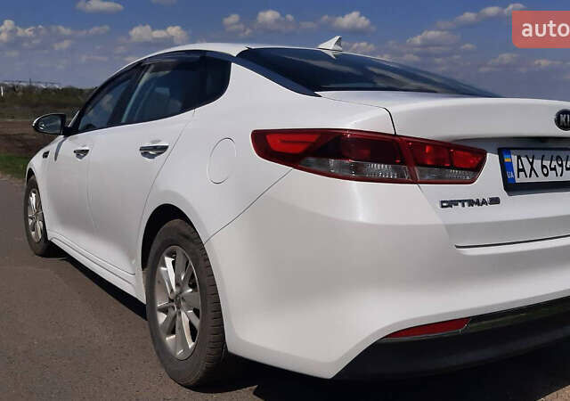 Белый Киа Оптима, объемом двигателя 2.36 л и пробегом 140 тыс. км за 11300 $, фото 6 на Automoto.ua