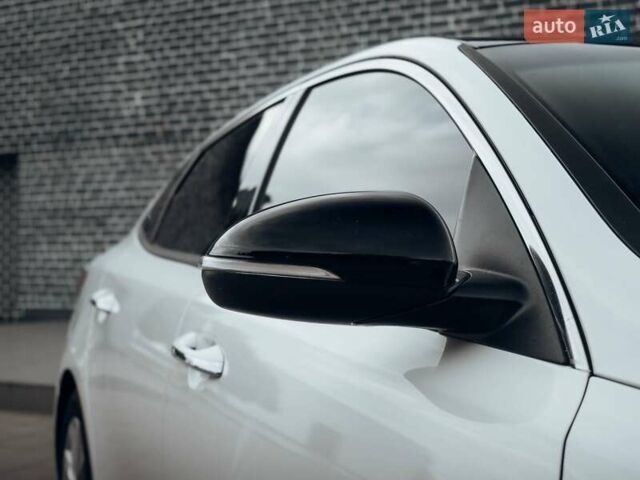 Белый Киа Оптима, объемом двигателя 2.4 л и пробегом 106 тыс. км за 9500 $, фото 2 на Automoto.ua