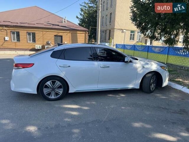 Білий Кіа Оптіма, об'ємом двигуна 2 л та пробігом 120 тис. км за 18000 $, фото 1 на Automoto.ua