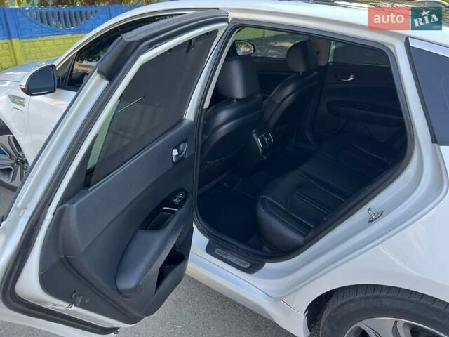 Білий Кіа Оптіма, об'ємом двигуна 2 л та пробігом 120 тис. км за 18000 $, фото 6 на Automoto.ua