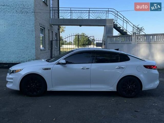 Білий Кіа Оптіма, об'ємом двигуна 2.36 л та пробігом 211 тис. км за 11450 $, фото 3 на Automoto.ua