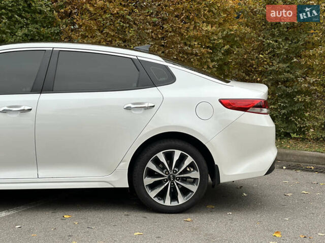 Білий Кіа Оптіма, об'ємом двигуна 2.36 л та пробігом 153 тис. км за 9500 $, фото 12 на Automoto.ua