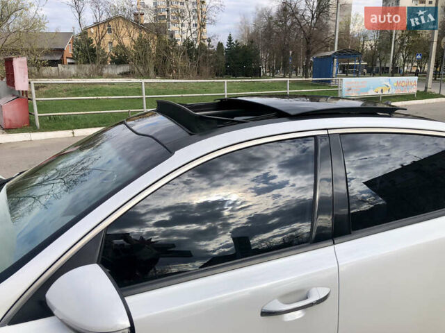 Белый Киа Оптима, объемом двигателя 2 л и пробегом 130 тыс. км за 16500 $, фото 11 на Automoto.ua