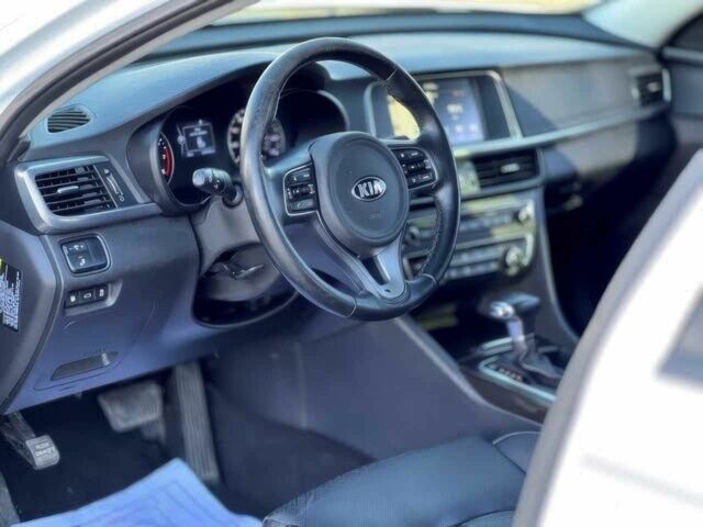 Белый Киа Оптима, объемом двигателя 2.4 л и пробегом 74 тыс. км за 2250 $, фото 7 на Automoto.ua