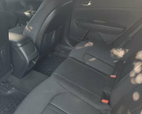 Білий Кіа Оптіма, об'ємом двигуна 2.36 л та пробігом 120 тис. км за 10300 $, фото 11 на Automoto.ua