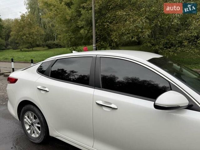 Білий Кіа Оптіма, об'ємом двигуна 2.4 л та пробігом 113 тис. км за 11400 $, фото 6 на Automoto.ua