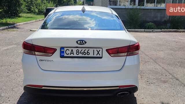 Белый Киа Оптима, объемом двигателя 2.4 л и пробегом 150 тыс. км за 12300 $, фото 7 на Automoto.ua