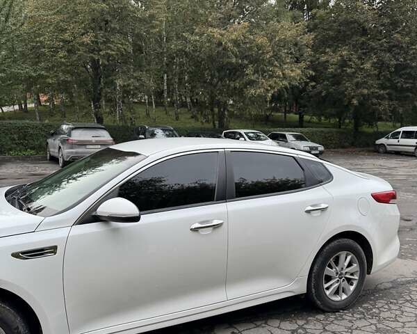 Білий Кіа Оптіма, об'ємом двигуна 2.4 л та пробігом 113 тис. км за 11400 $, фото 9 на Automoto.ua