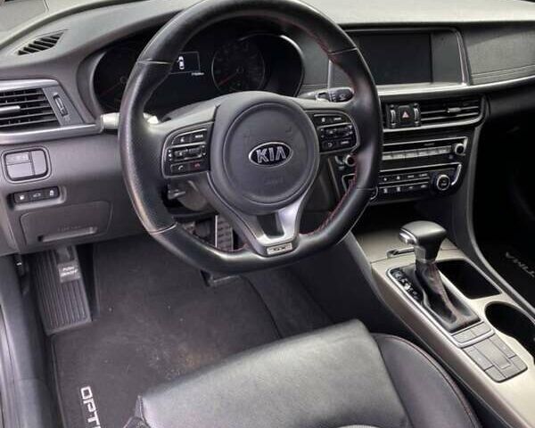 Белый Киа Оптима, объемом двигателя 2 л и пробегом 100 тыс. км за 10200 $, фото 5 на Automoto.ua