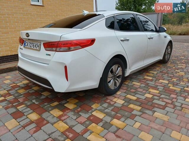 Білий Кіа Оптіма, об'ємом двигуна 2 л та пробігом 140 тис. км за 13500 $, фото 7 на Automoto.ua