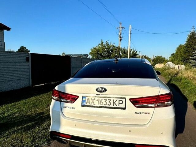 Білий Кіа Оптіма, об'ємом двигуна 2 л та пробігом 161 тис. км за 15500 $, фото 2 на Automoto.ua