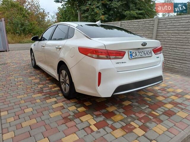 Білий Кіа Оптіма, об'ємом двигуна 2 л та пробігом 140 тис. км за 13500 $, фото 6 на Automoto.ua