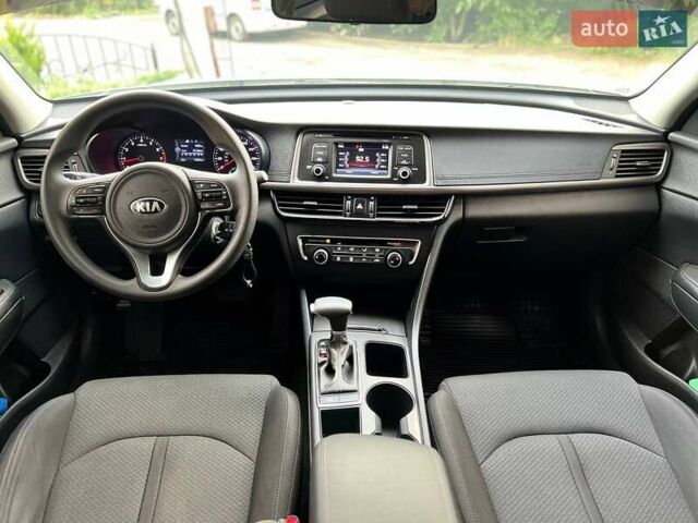Белый Киа Оптима, объемом двигателя 2.36 л и пробегом 118 тыс. км за 10700 $, фото 14 на Automoto.ua