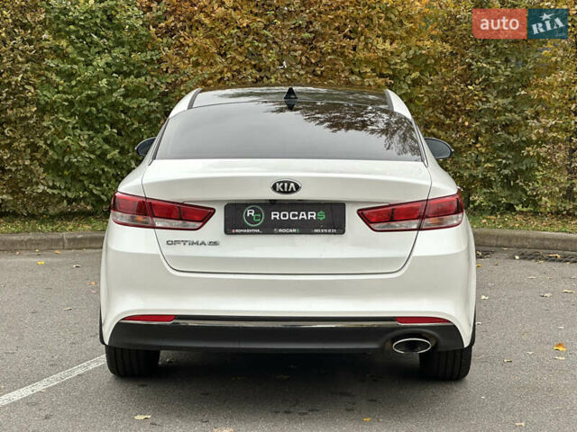 Білий Кіа Оптіма, об'ємом двигуна 2.36 л та пробігом 153 тис. км за 9500 $, фото 13 на Automoto.ua