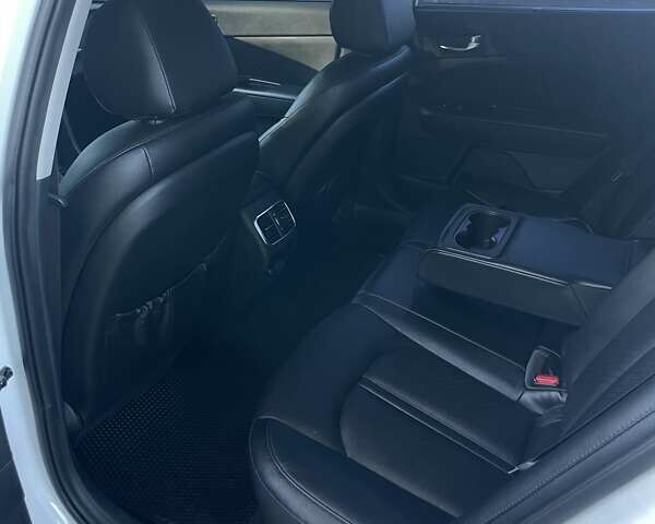 Білий Кіа Оптіма, об'ємом двигуна 2.36 л та пробігом 211 тис. км за 11450 $, фото 17 на Automoto.ua