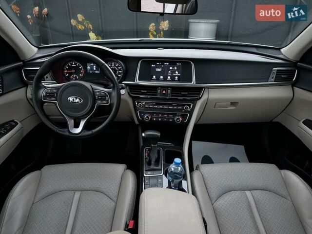 Белый Киа Оптима, объемом двигателя 2.36 л и пробегом 110 тыс. км за 12500 $, фото 13 на Automoto.ua