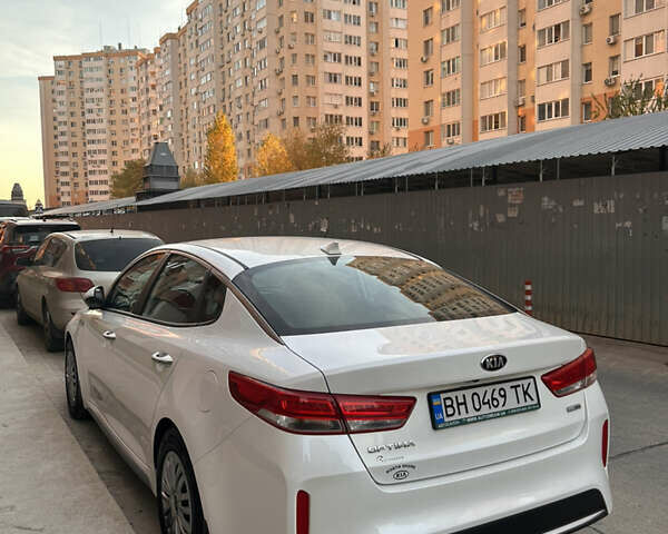 Білий Кіа Оптіма, об'ємом двигуна 2 л та пробігом 68 тис. км за 17500 $, фото 42 на Automoto.ua