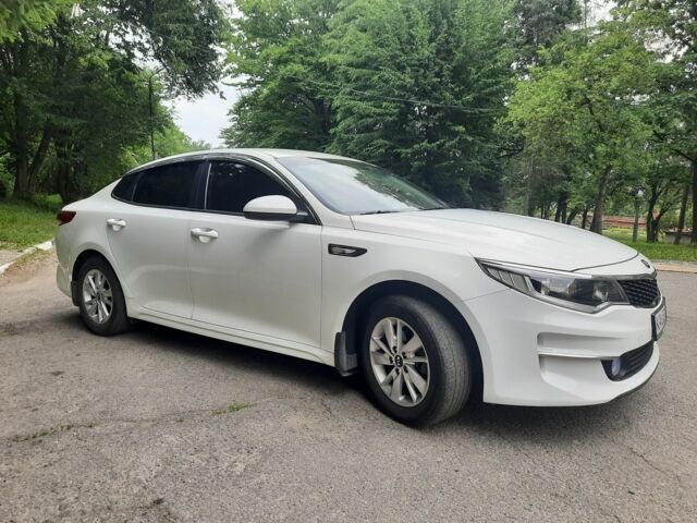 Белый Киа Оптима, объемом двигателя 2 л и пробегом 200 тыс. км за 11900 $, фото 4 на Automoto.ua