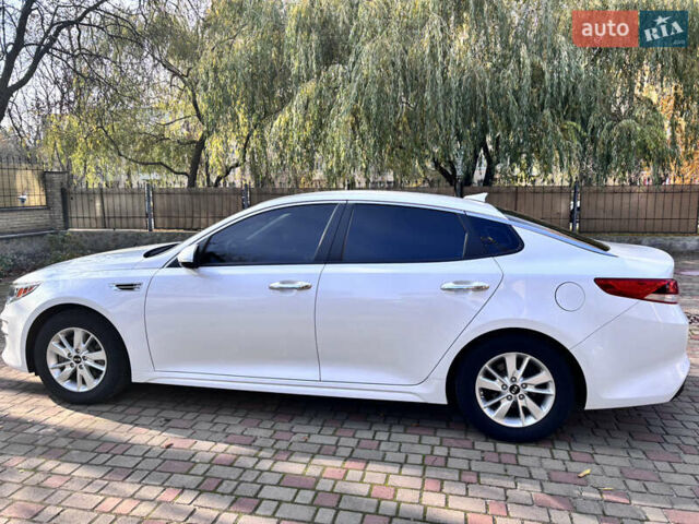 Білий Кіа Оптіма, об'ємом двигуна 2.4 л та пробігом 84 тис. км за 11499 $, фото 4 на Automoto.ua