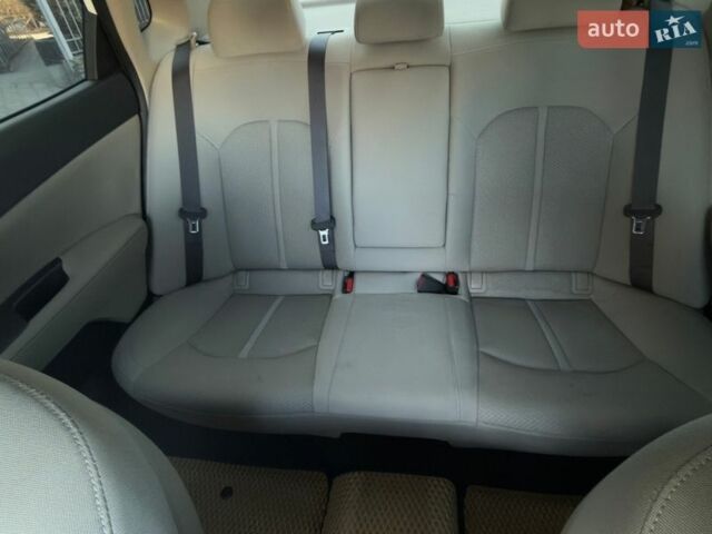 Білий Кіа Оптіма, об'ємом двигуна 2 л та пробігом 134 тис. км за 15500 $, фото 12 на Automoto.ua
