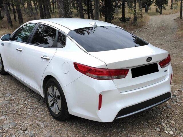 Белый Киа Оптима, объемом двигателя 2 л и пробегом 83 тыс. км за 9800 $, фото 7 на Automoto.ua