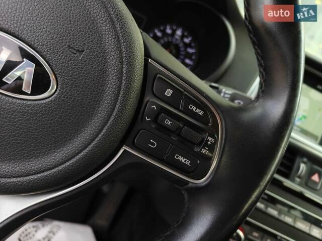 Белый Киа Оптима, объемом двигателя 2 л и пробегом 130 тыс. км за 16000 $, фото 13 на Automoto.ua