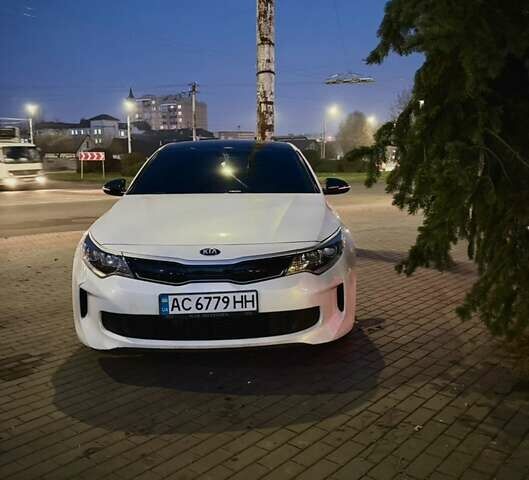 Белый Киа Оптима, объемом двигателя 2 л и пробегом 230 тыс. км за 13000 $, фото 1 на Automoto.ua